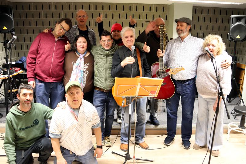 Group photo of the Orchestra of Good Luck after the last rehearsal before the twentieth-anniversary concert and the farewell of its founder.