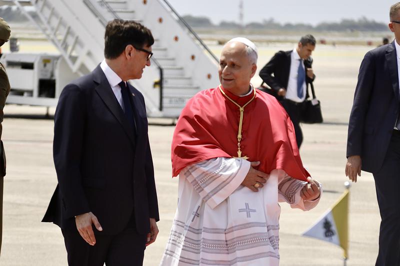 Pope Leo XIV with the president of Catalonia, Salvador Illa, just after landing at Barcelona airport