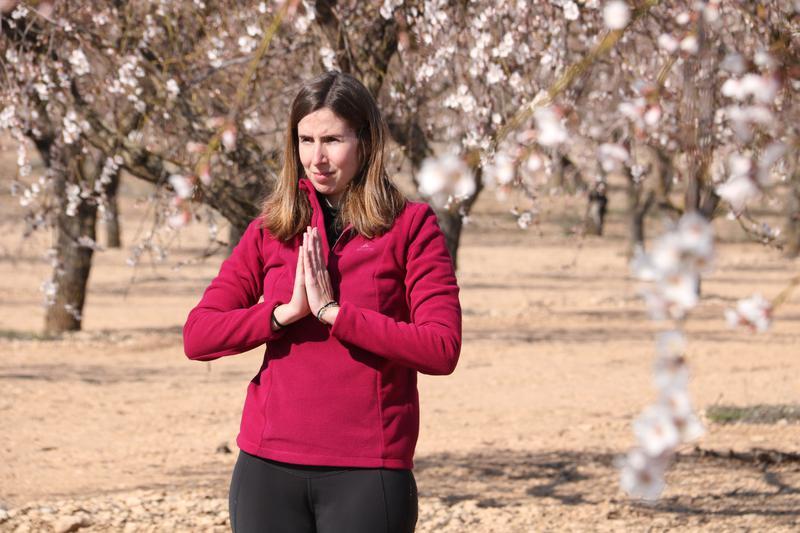 Yoga among the almond blossoms in Arbeca, western Catalonia