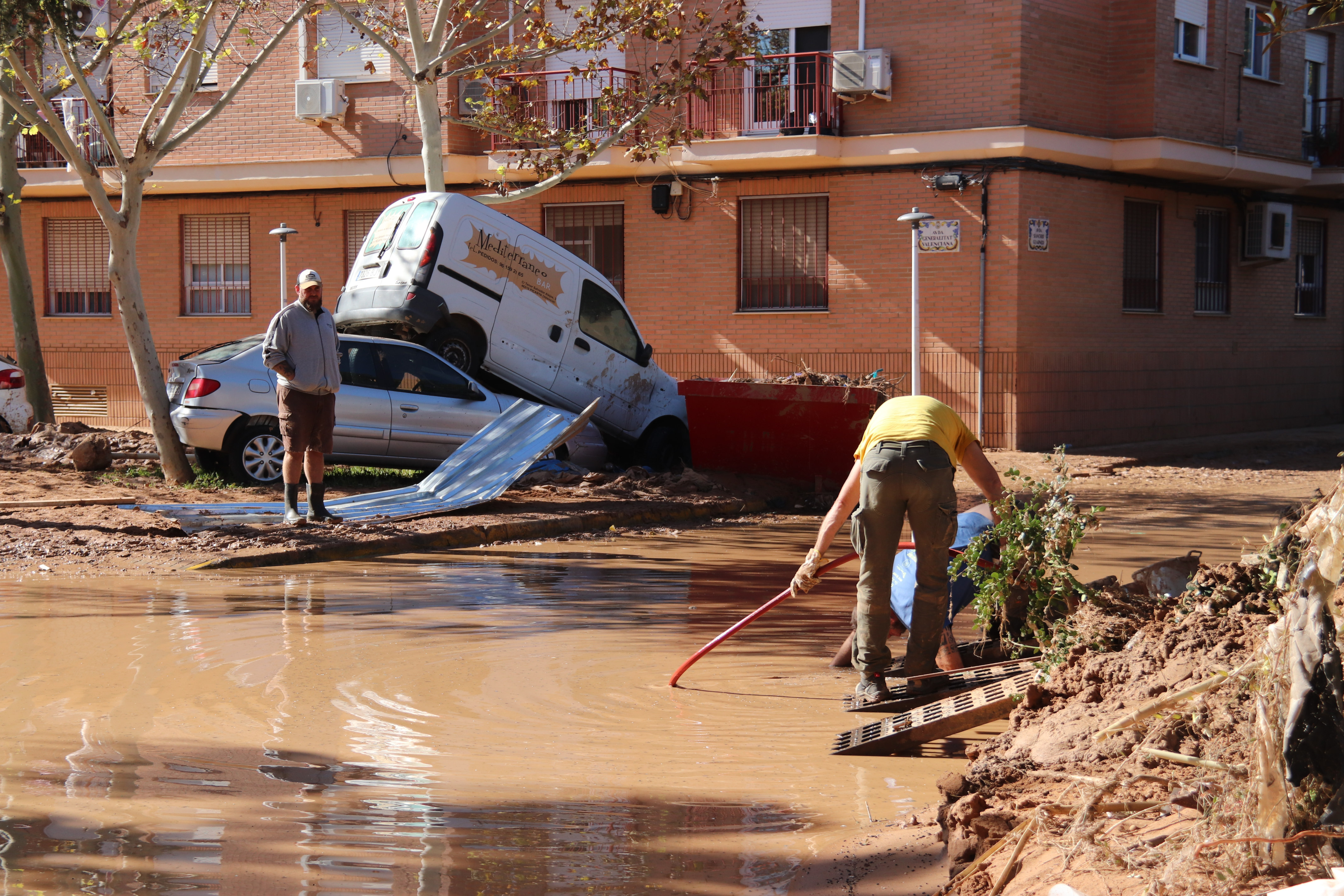 Catalan volunteers help clean up in the town of Picanya