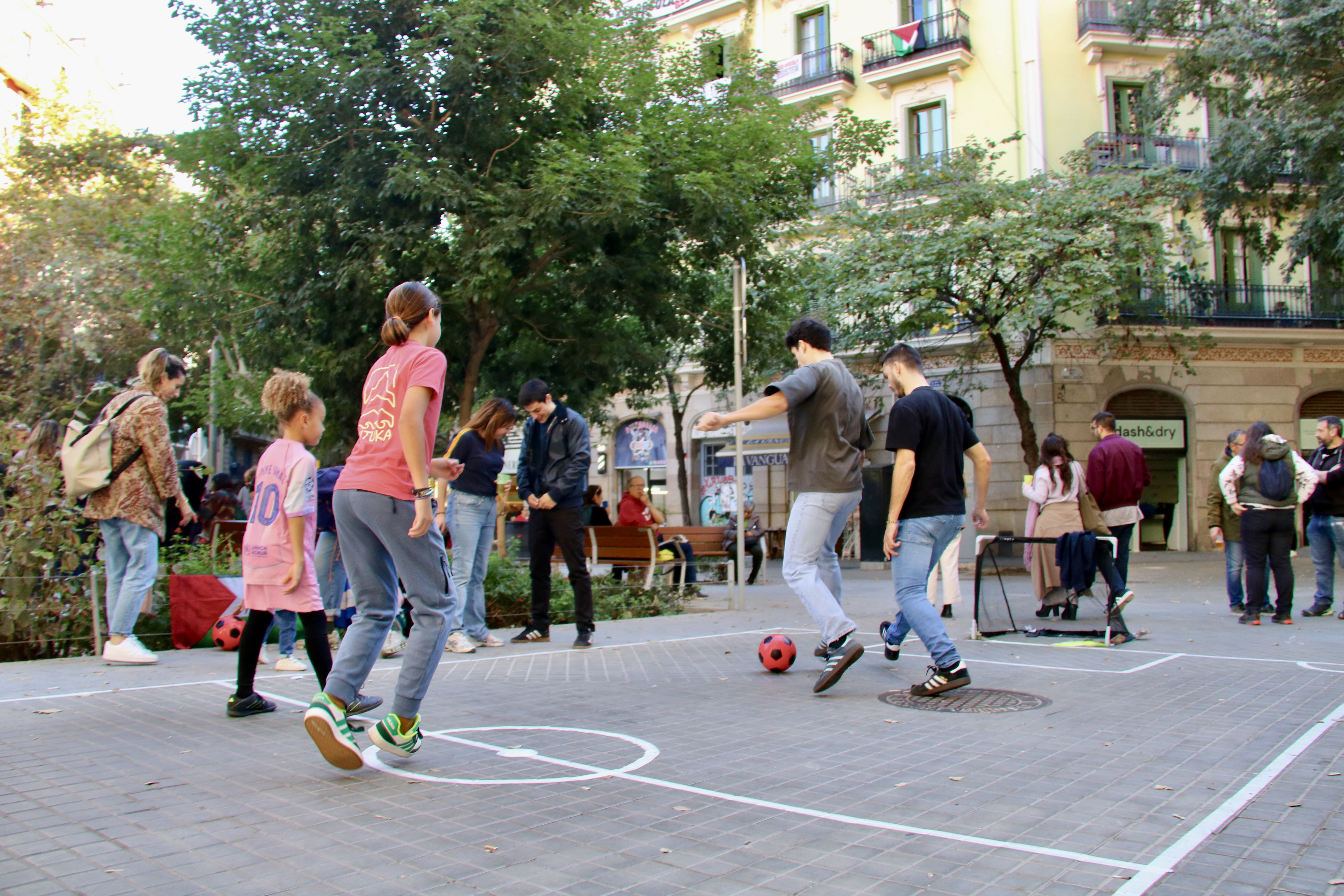 Attendees playing a three-a-side football match