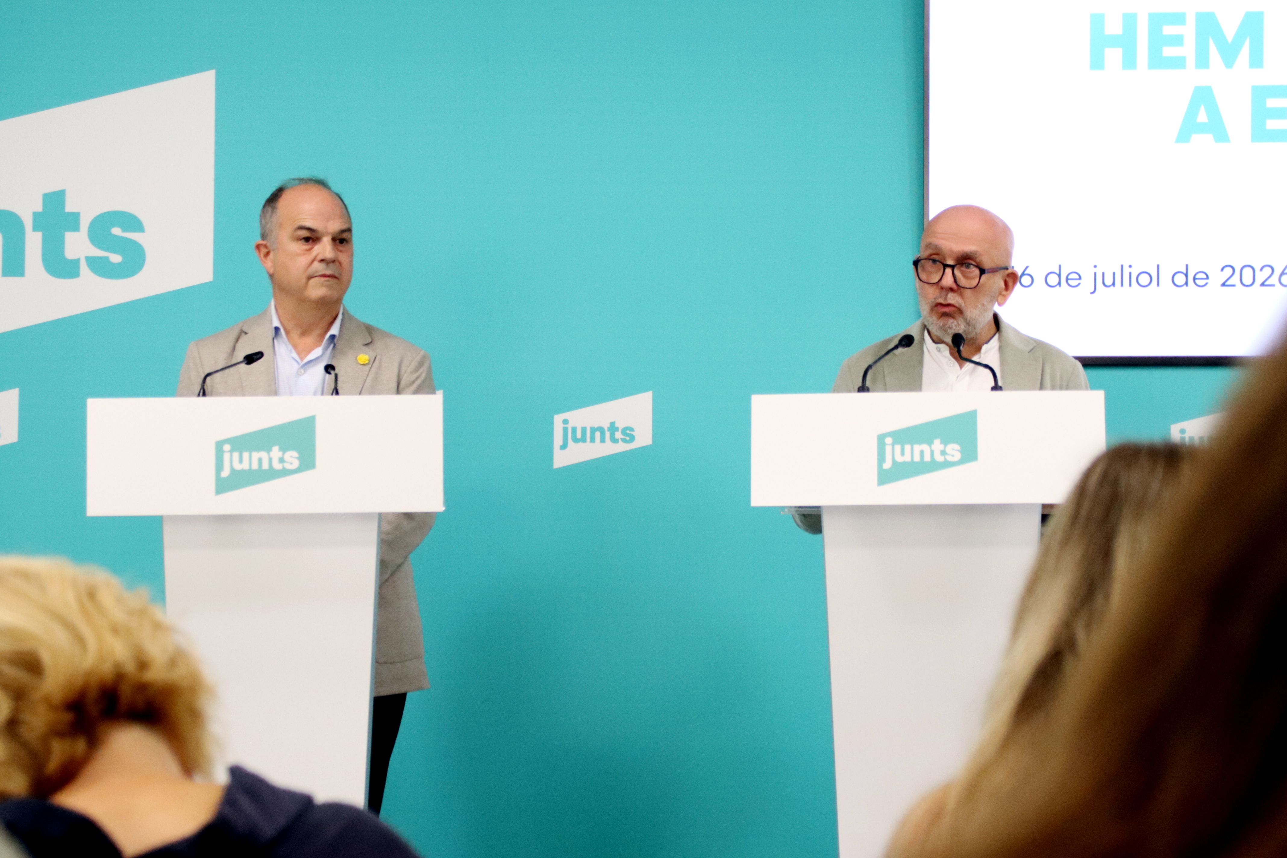 Junts secretary general Jordi Turull and lawyer Gonzalo Boye speak to the media at Junts' headquarters