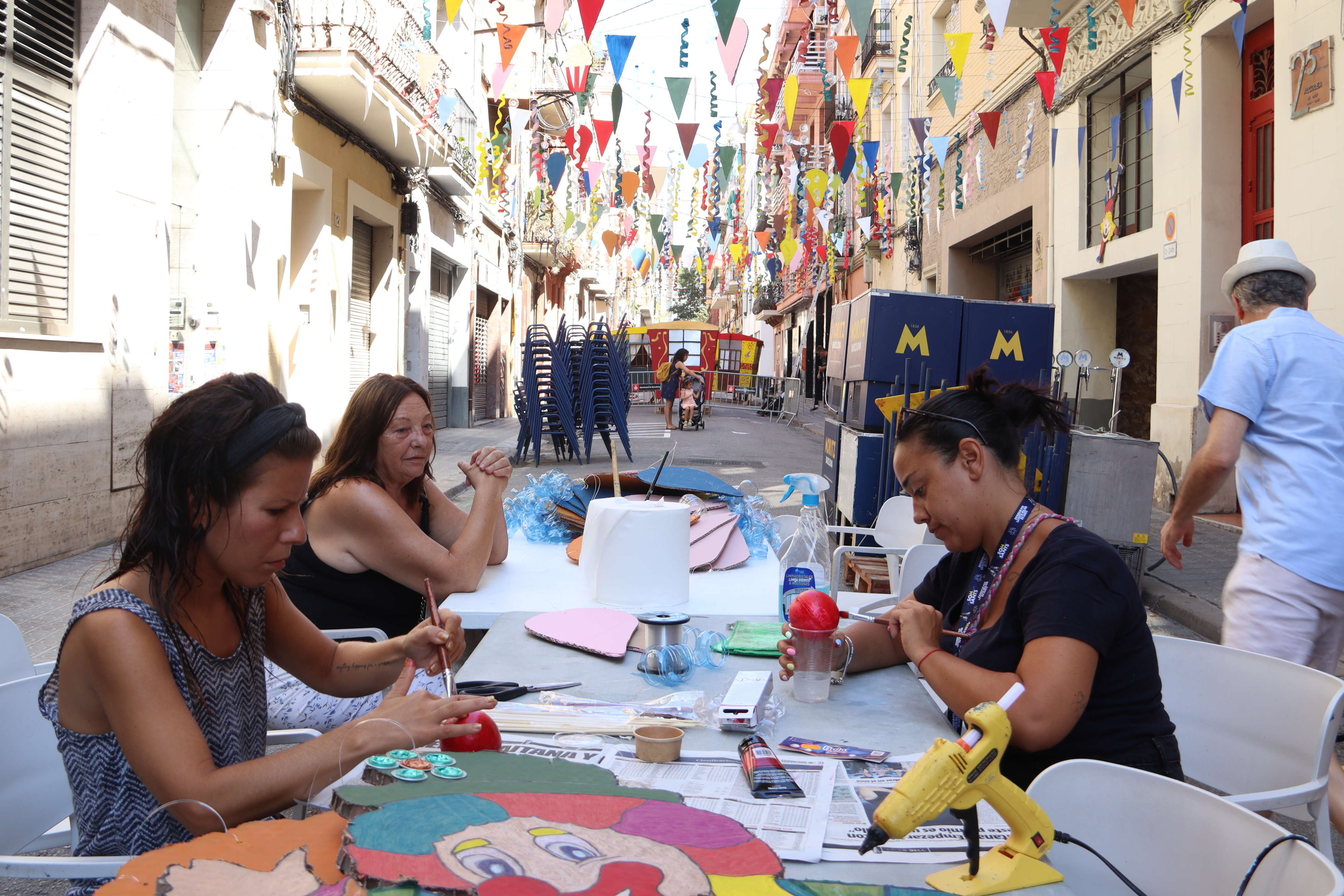 Sants residents decorating their street for the annual Festa Major